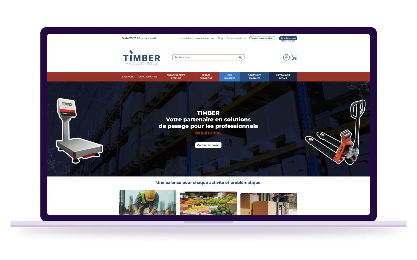 Page d'accueil du site Timber affichée sur un ordinateur portable : balances, transpalettes et solutions de pesage pour les professionnels.